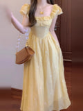 French Yellow Flying Sleeves Shredded Flower Dress Women's Summer 2025 New Waist Temperament Princess Holiday Dress