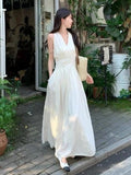 French Hanging Neck V-Neck Sleeveless Dress Women's Summer 2026 New Temperament To Receive The Waist Thin Hourglass Waist Long Skirt
