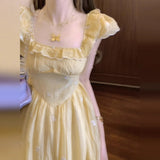 French Yellow Flying Sleeves Shredded Flower Dress Women's Summer 2025 New Waist Temperament Princess Holiday Dress