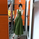 2025 New French Retro Green Hanging Neck Sling Dress Female Summer Temperament Waist Dress
