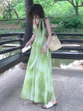 French Super-Look Unique Beautiful Green Halo Print Sling Dress Seaside Holiday Dress 2026 Summer