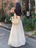 French Hanging Neck V-Neck Sleeveless Dress Women's Summer 2026 New Temperament To Receive The Waist Thin Hourglass Waist Long Skirt