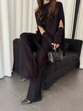 Autumn And Winter Fashion High-End Lazy Wind Bat Sleeve Loose Knitted Sweater + Sleeve + Broad Leg Pants Three-Piece Set