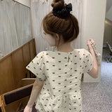 French Round-Neck Bow Bow Print Short-Sleeved Shirt Women's Clothing 2025 Summer Fold Reduction Loose Coat Bubble Sleeve