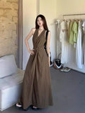 Seaside Vacation French Hanging Neck Sling Dress Women's Summer 2026 New High-End Temperament Waist Dress
