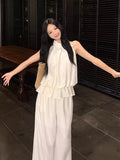 French Temperament Sleeveless Lotus Leaf Side Hanging Neck Vest Top Female Design Sense Loose Broad Legs Long Pants Set Summer