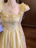 French Yellow Flying Sleeves Shredded Flower Dress Women's Summer 2025 New Waist Temperament Princess Holiday Dress